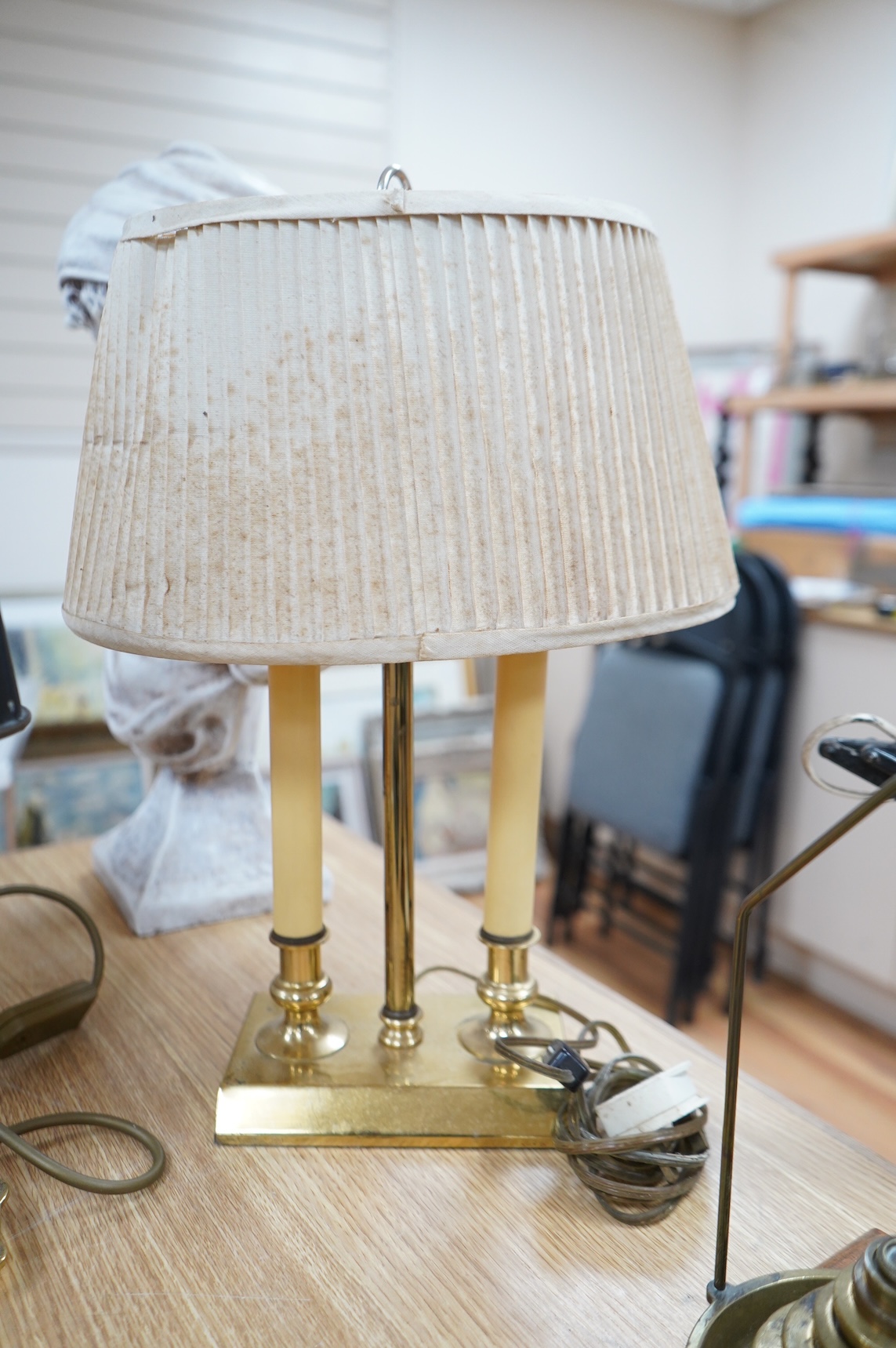 Two early 20th century French brass desk lamps, tallest 45cm